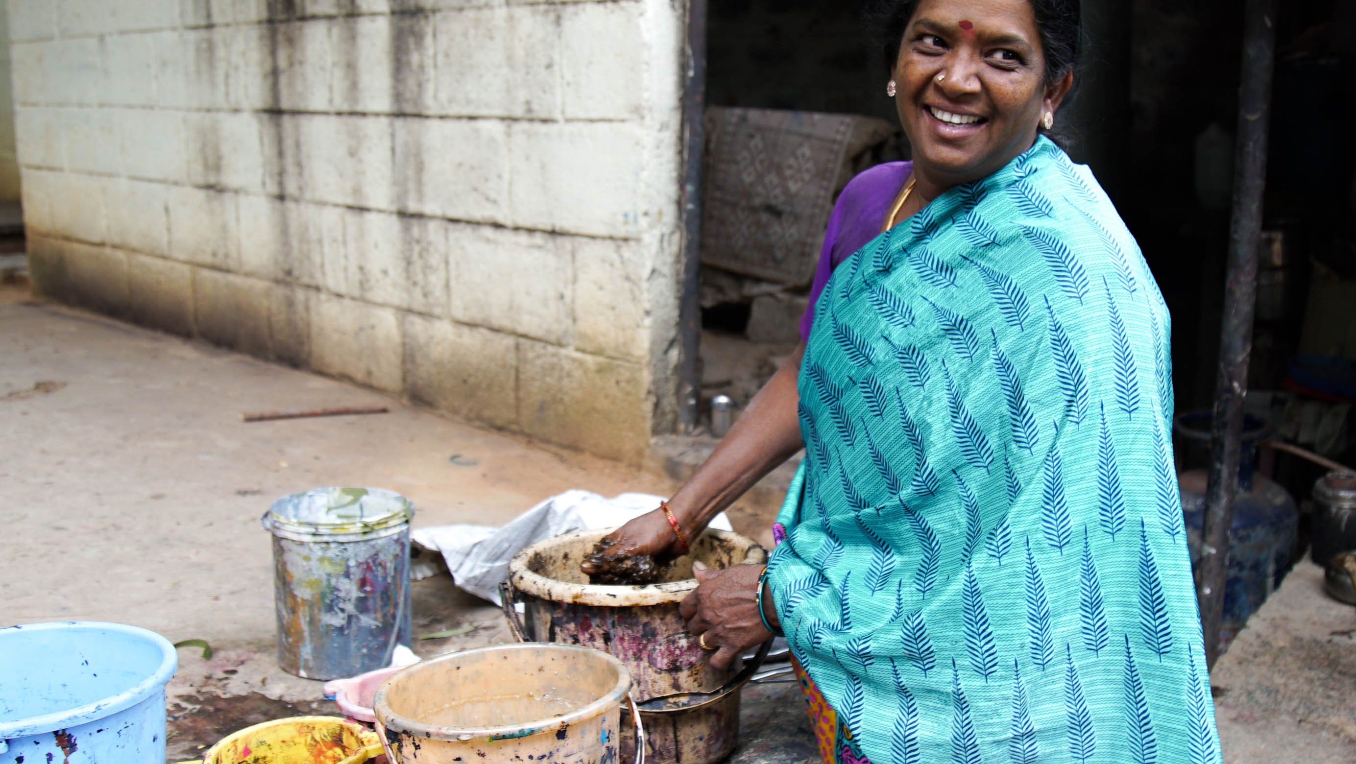 Tharangini mixing dyes for fabric